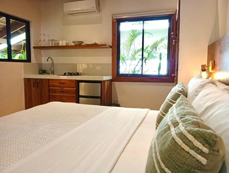 Kitchenette and dining area in Standard King Bungalow 1 at Makanas Beach Bungalows
