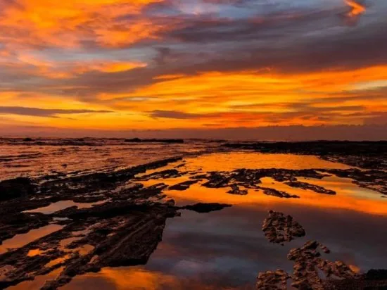 Sunset over the beach at Makanas Beach Bungalows in Santa Teresa, Costa Rica