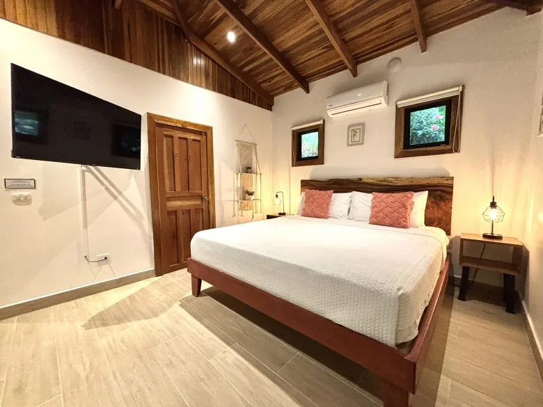 King bed in Deluxe King Bungalow 2 at Makanas Beach Bungalows