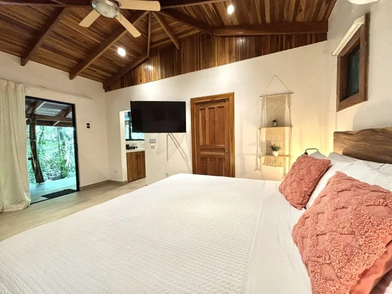 Bedroom in Deluxe King Bungalow 2 at Makanas Beach Bungalows