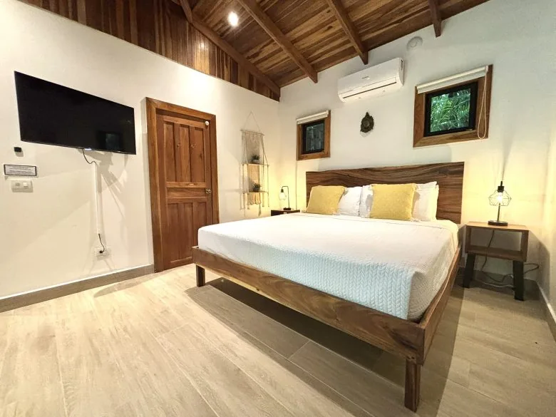 King bed in Deluxe King Bungalow 3 at Makanas Beach Bungalows