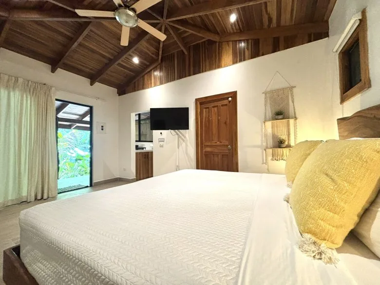 Bedroom in Deluxe King Bungalow 3 at Makanas Beach Bungalows